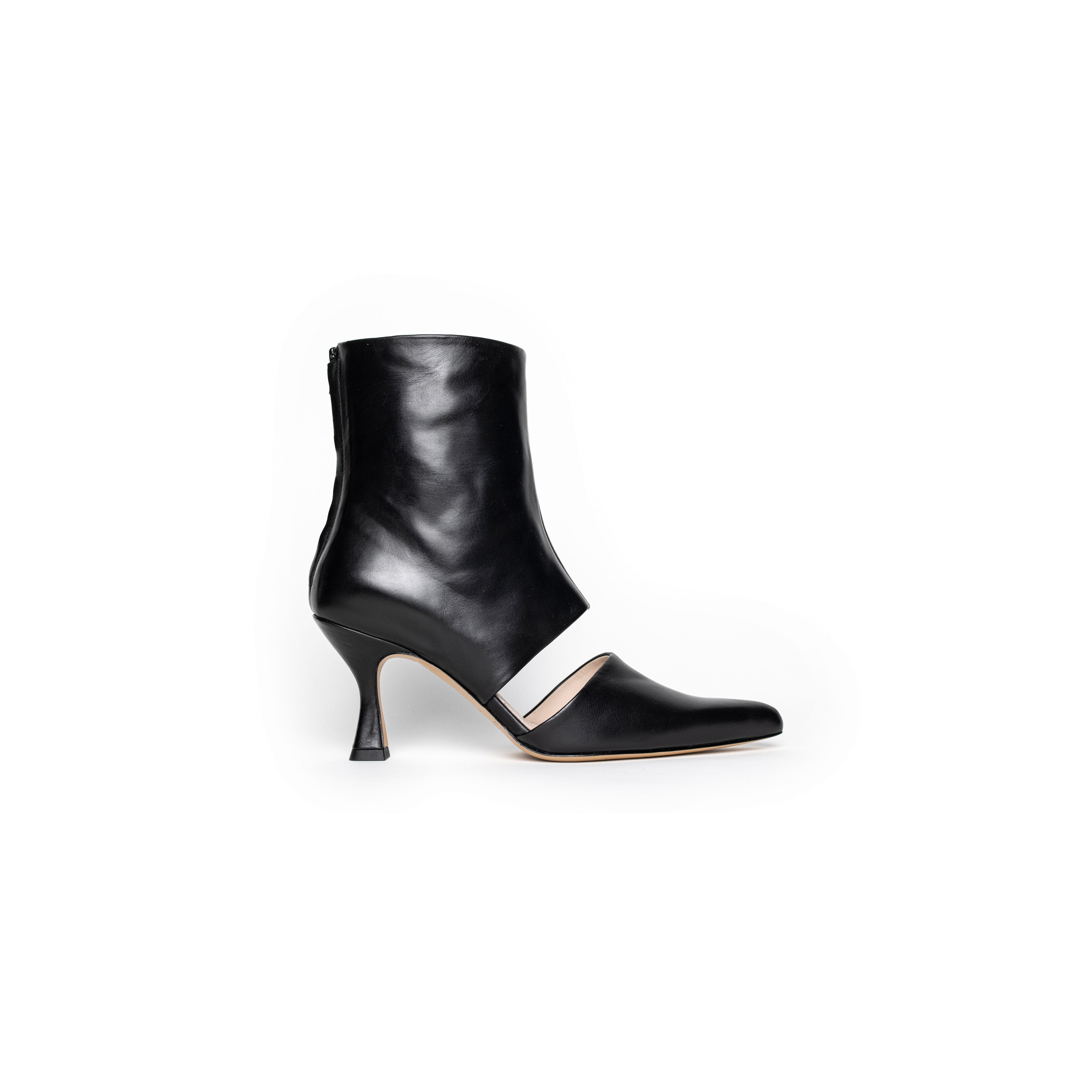 KALDA black leather pointy toe ankle boots with a cut-out detail, side view