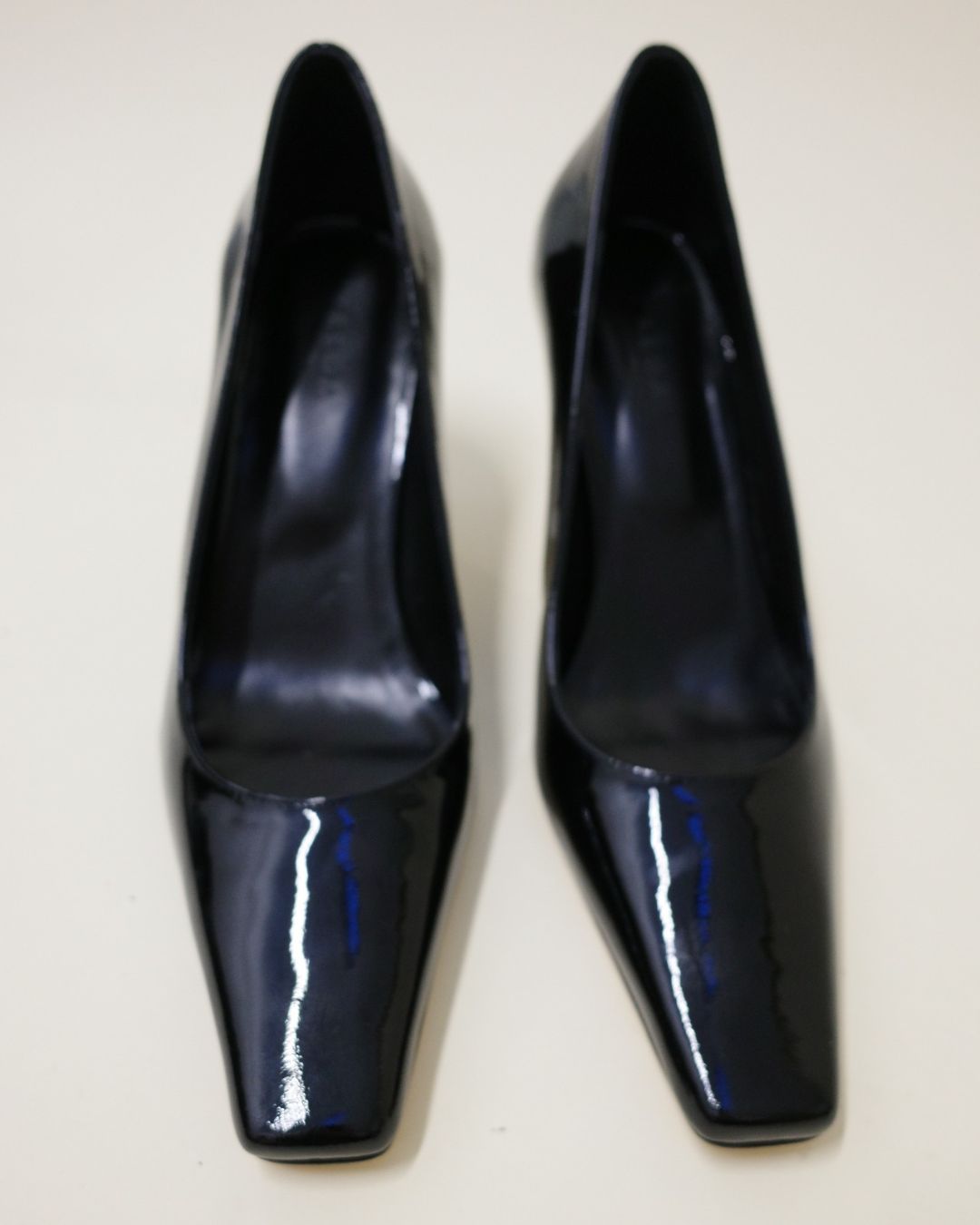 KALDA black patent pumps 