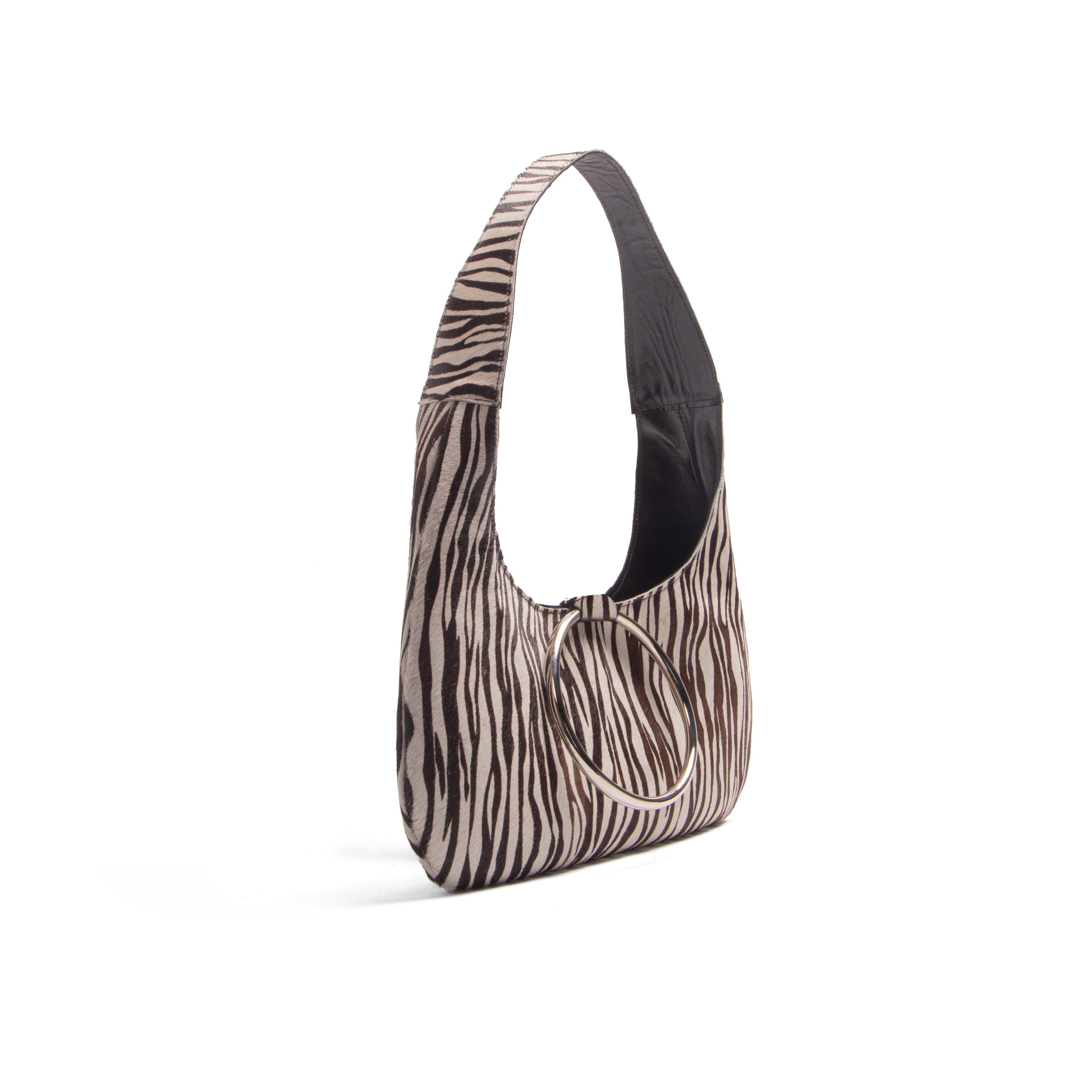 KALDA Zebra patterned handbag on a white background side view