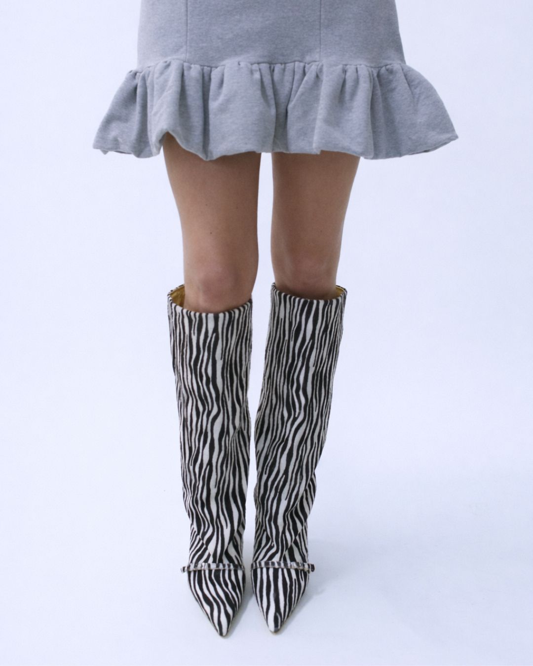 KALDA Zebra-striped knee-high boots front view