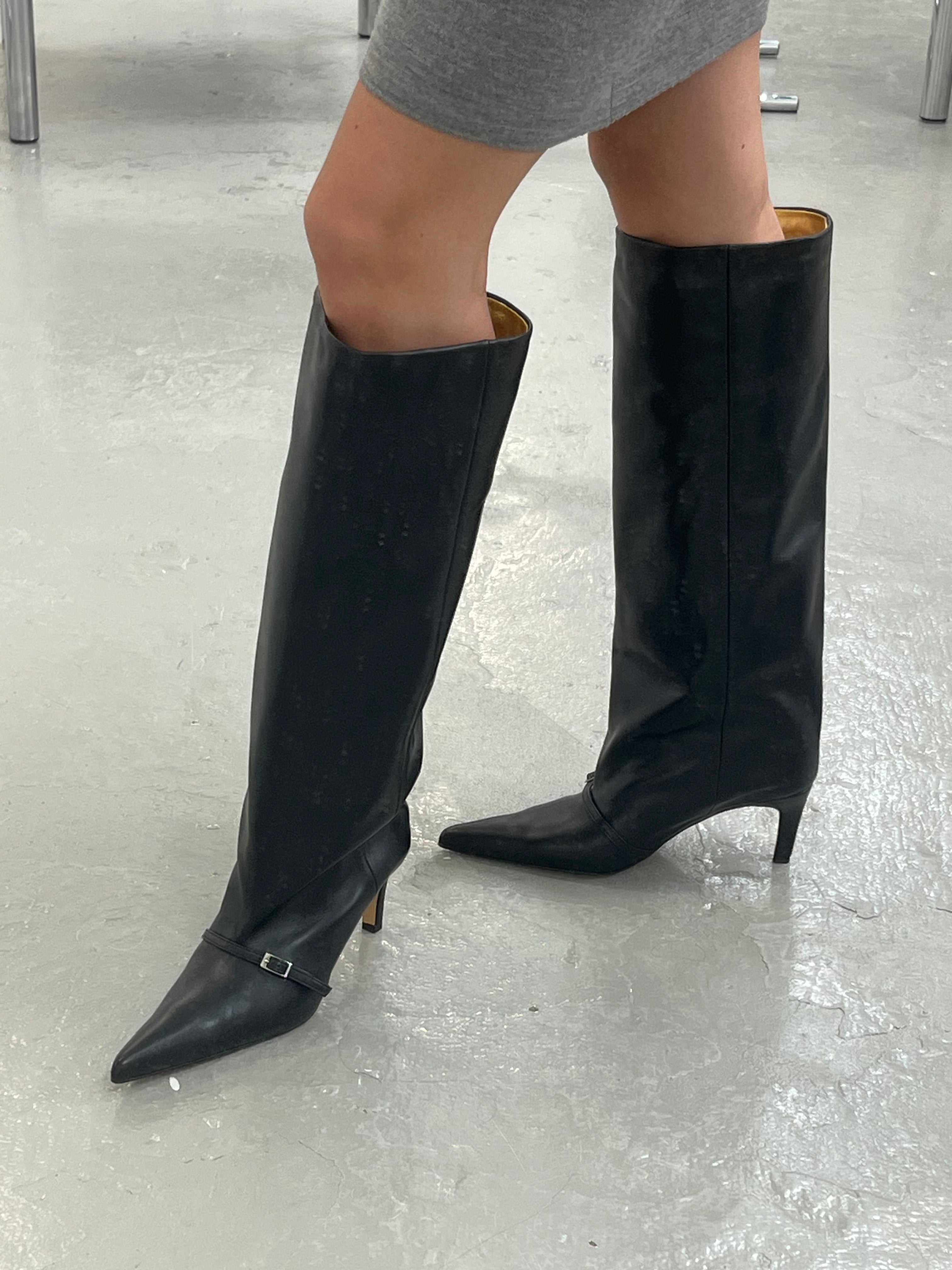 KALDA black leather boots on the leg